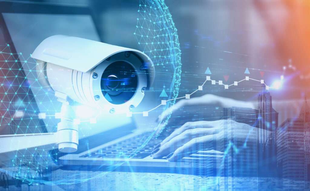 Woman hands on laptop and CCTV camera interface vidéoprotection algorithmique