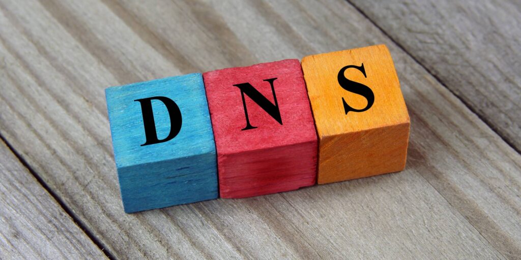 DNS (Domain Name System) acronym on colorful wooden cubes