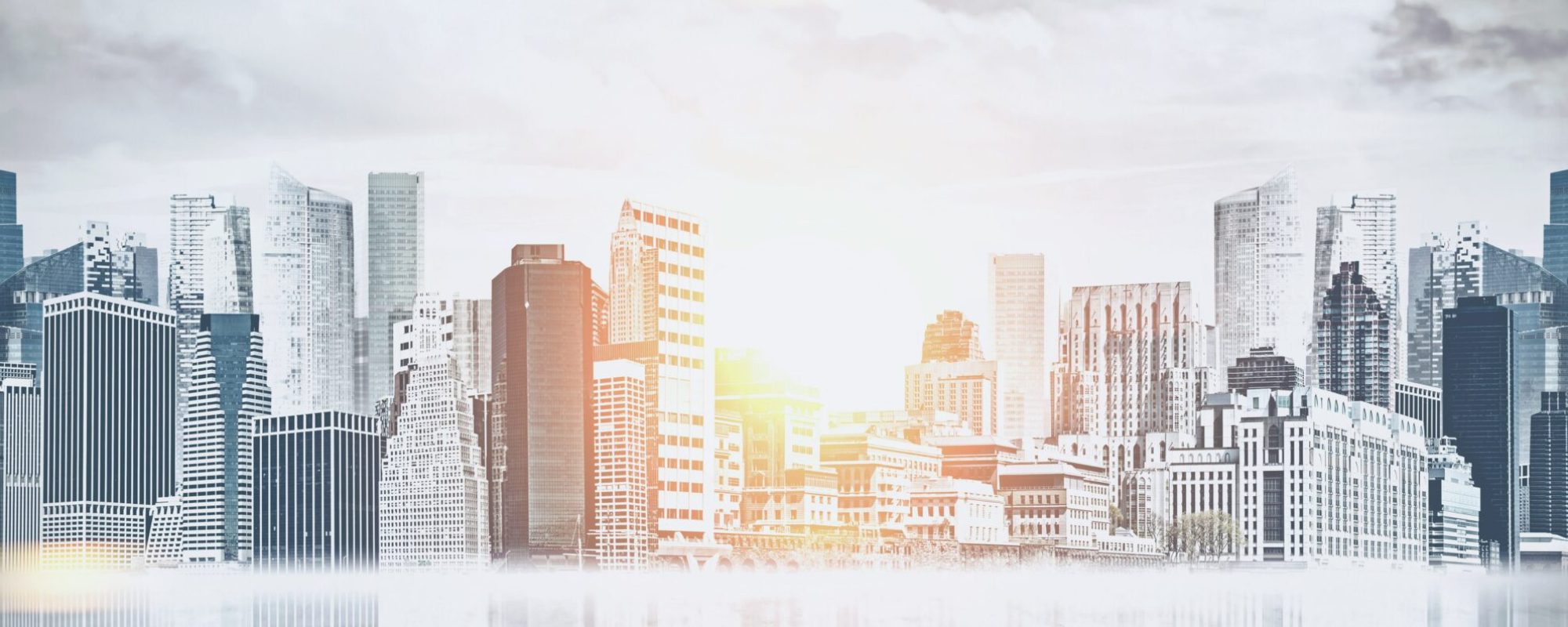 Panoramic view of a beautiful modern city with skyscrapers and a reflecting surface in the foreground. Business concept. Toned image double exposure mock up